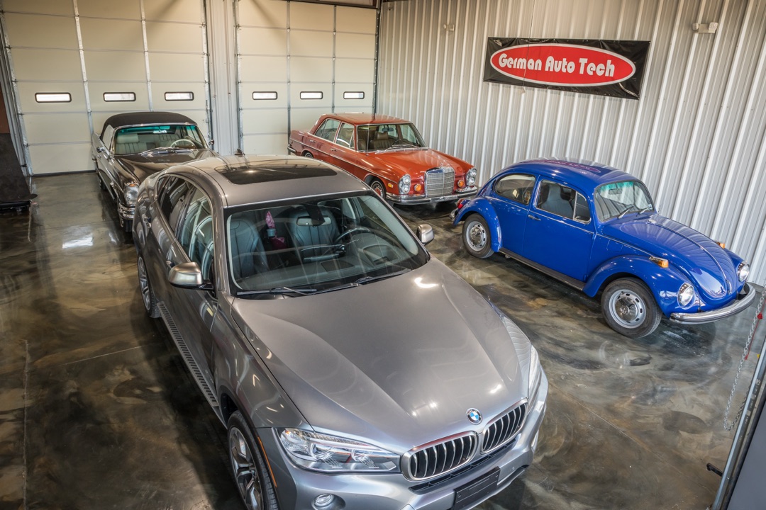 Classic Volkswagen Beetle and classic Mercedes vehicles at German Auto Tech